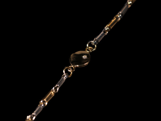 Bicolor Bracelet in 9K Yellow and White Gold with Round Pendant and Cubic Zirconia