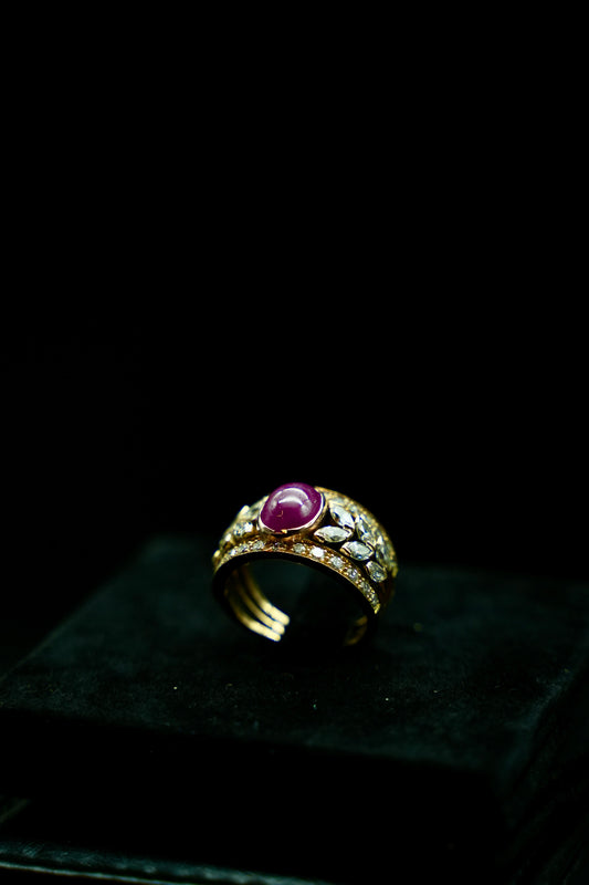 Ring in 18K Yellow Gold with 1.50 ct Natural Ruby Cabochon and 0.95 ct Natural Diamonds