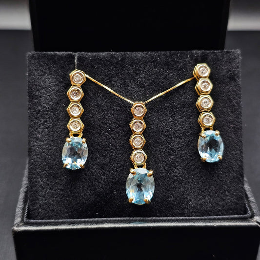 Elegant Jewelry Set in 18K Yellow Gold with Blue Topaz and 0.60 ct Natural Diamonds
